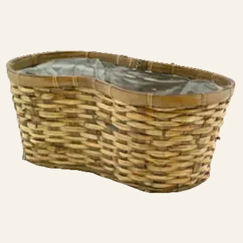 Wicker planter basket with a white background
