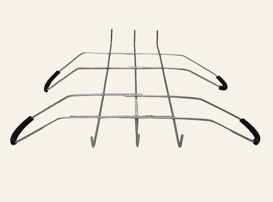Metal wire rack with black handles on a white background