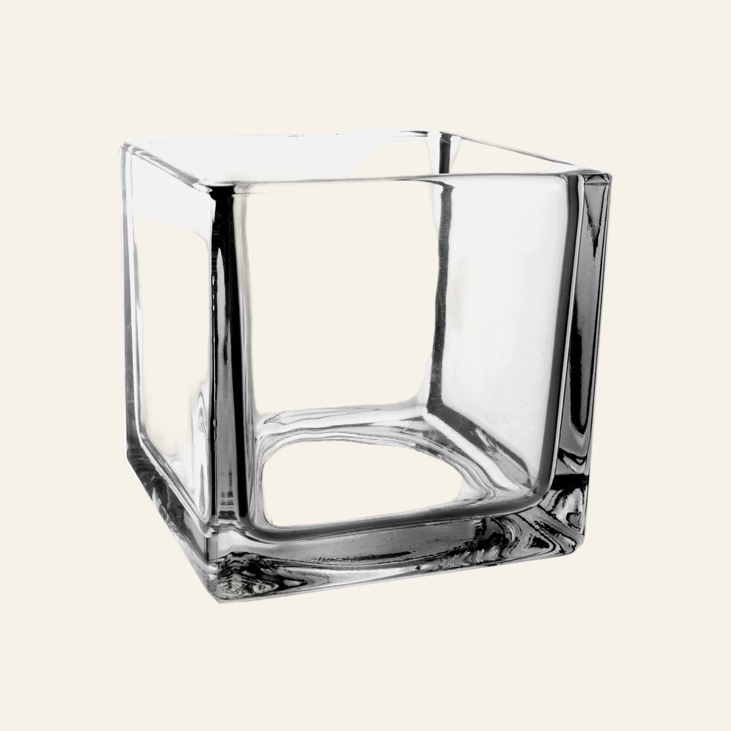 Clear glass square vase on a white background