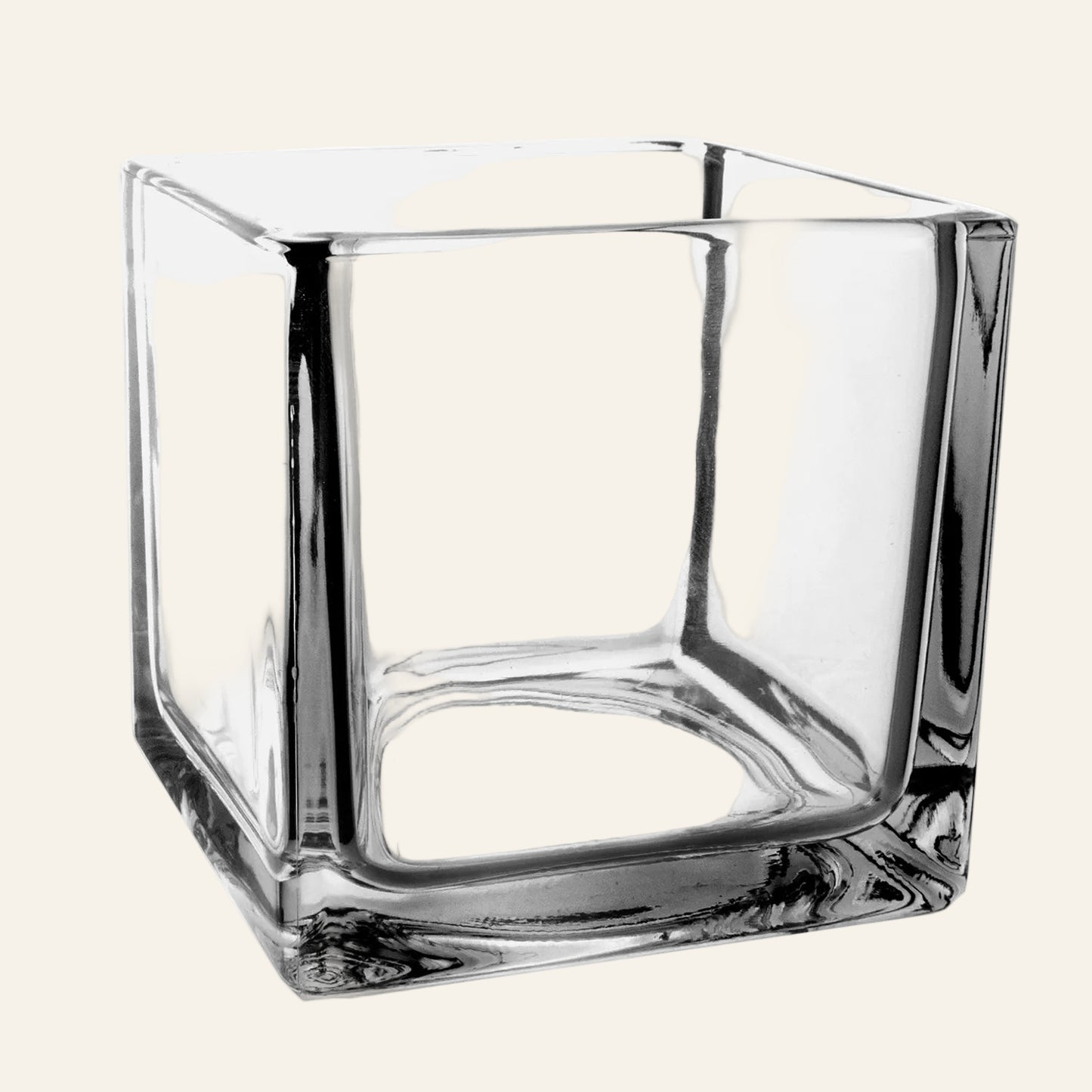 Clear glass square vase on a white background