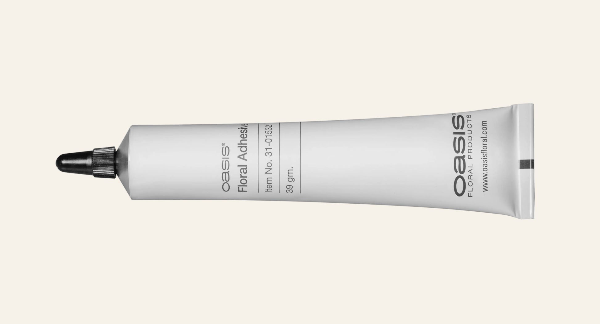 Oasis floral adhesive tube on a white background