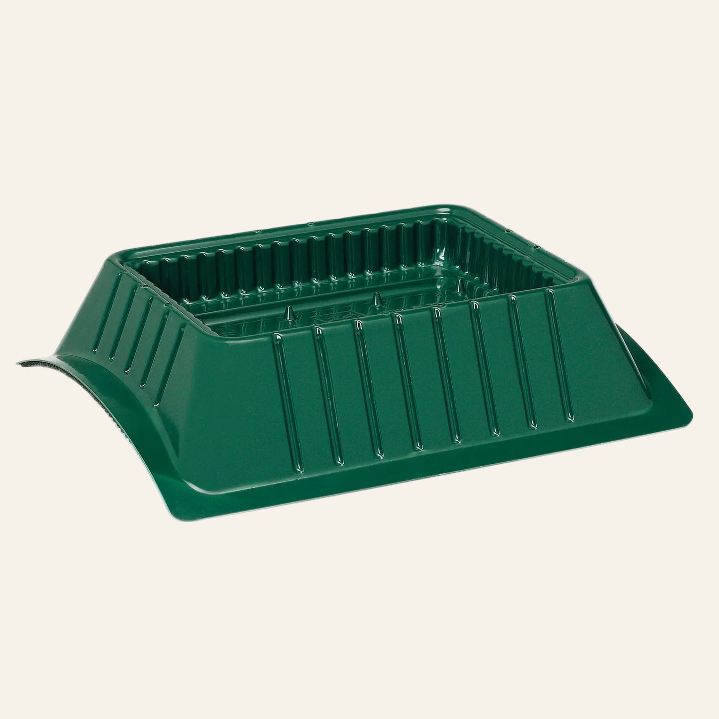 Green plastic tray on a white background