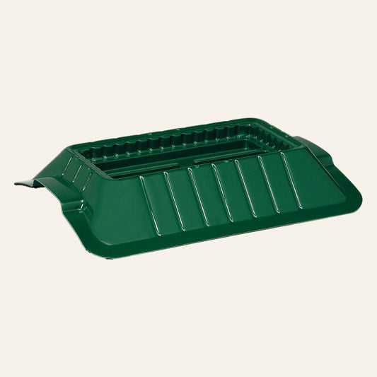 Green plastic tray on a white background