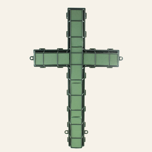 Green cross-shaped wreath on a white background