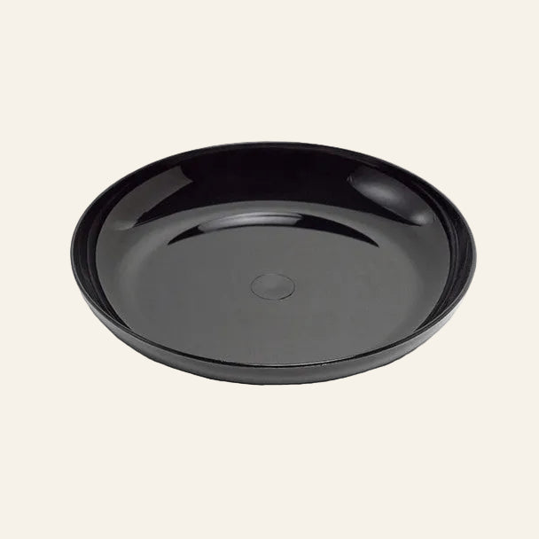 Black round tray on a white background