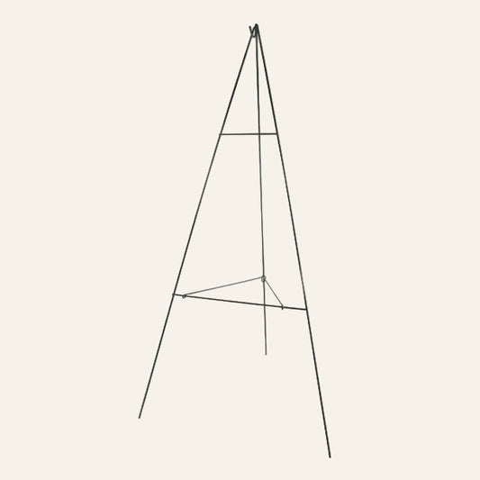 Black metal easel on a white background