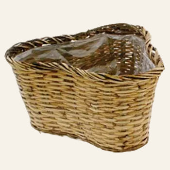 Wicker basket with a clear plastic liner on a white background