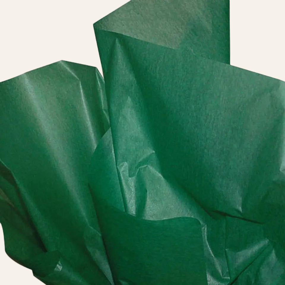 Green tissue paper on a white background